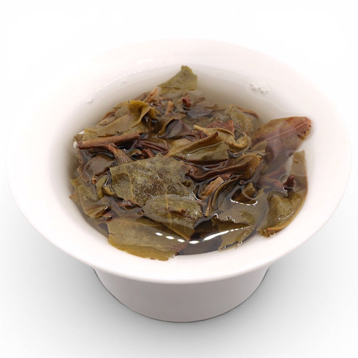 BingDao Laozhai Huang Pian Mini Cake Sheng - Tea and Whisk