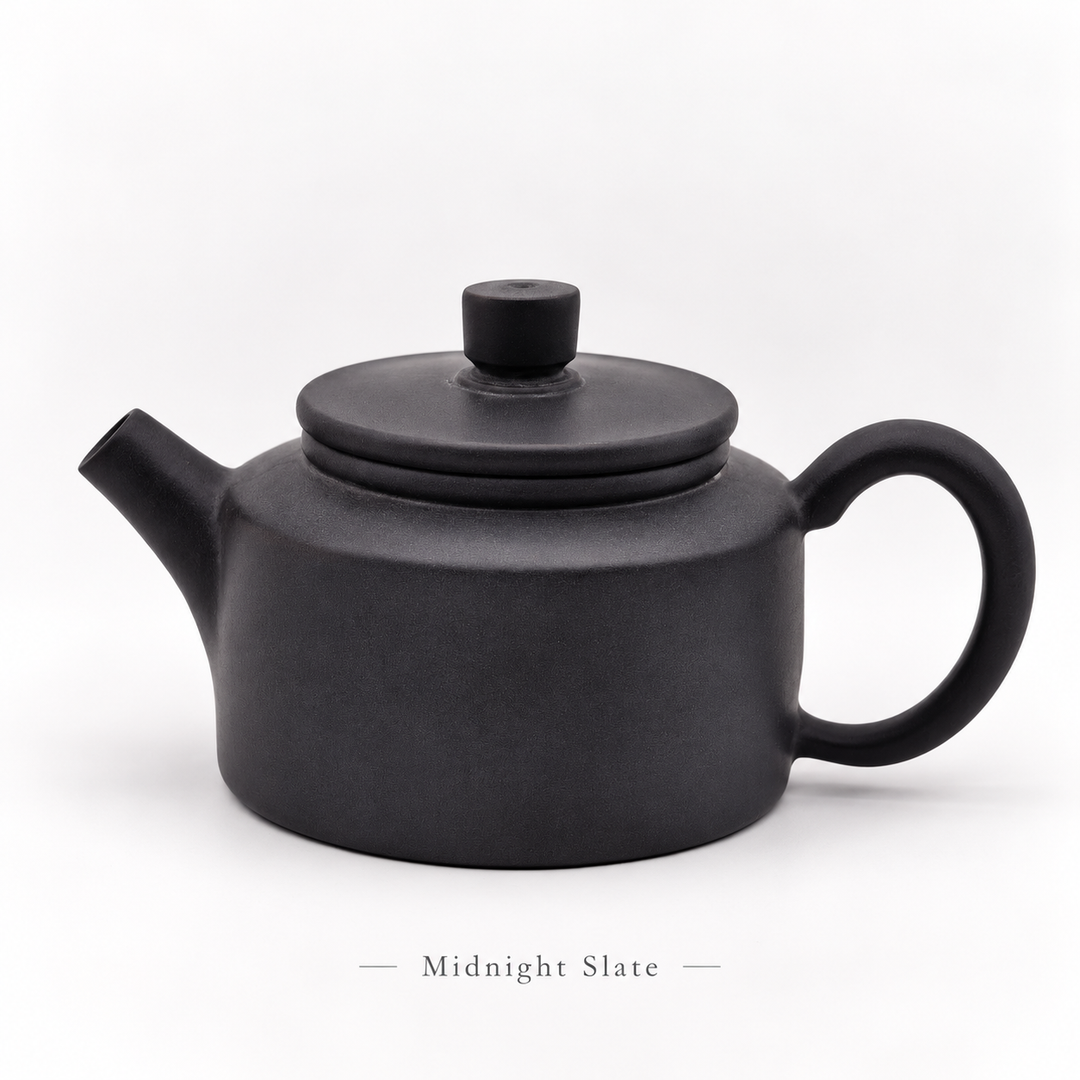 Midnight Slate #12, cleaned front view of the 80 ml Jianshui Little Drum teapot, with subtitle