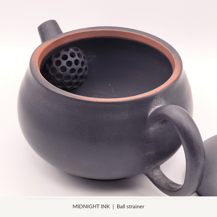Midnight Ink, inside ball strainer and reddish clay rim of the 100 ml Jianshui teapot