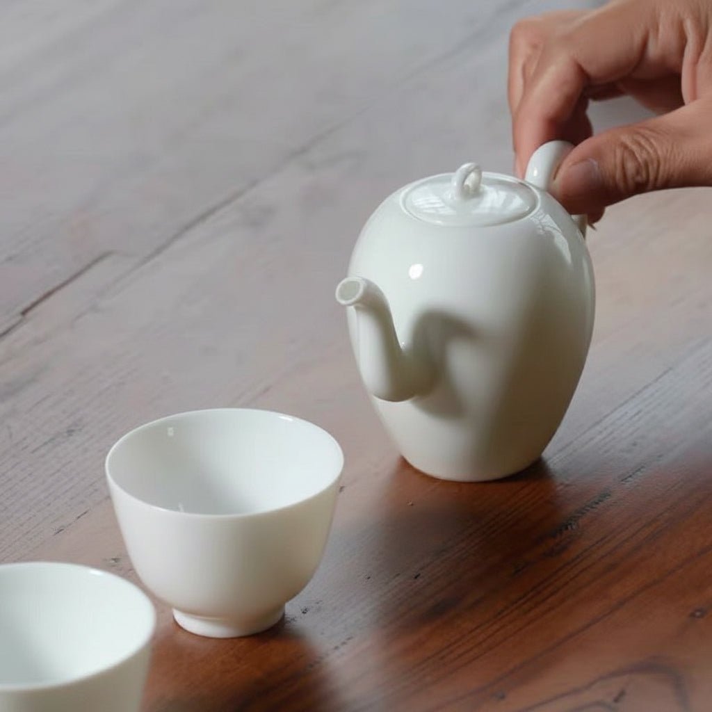 Jingdezhen “Beauty Shoulder” Pure White Jade Porcelain Gongfu Teapot - Tea and Whisk