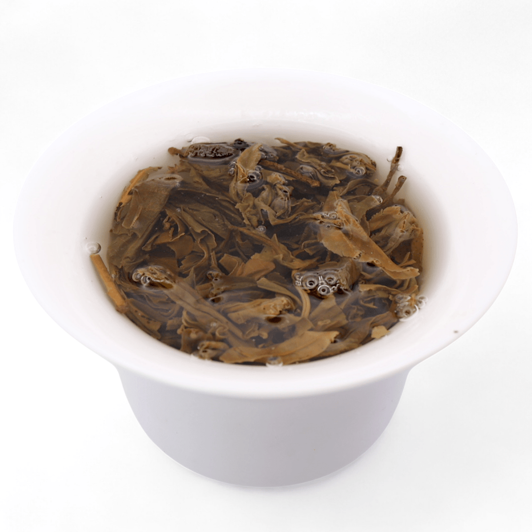 Phoenix Mountain Gushu Raw Puerh Cake Version - Tea and Whisk